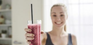Young woman making detox smoothie at home; Shutterstock ID 674121652; Purchase Order: PO231817; Job: Liiv Brochure; Client/Licensee: Larry Gerrard Avon